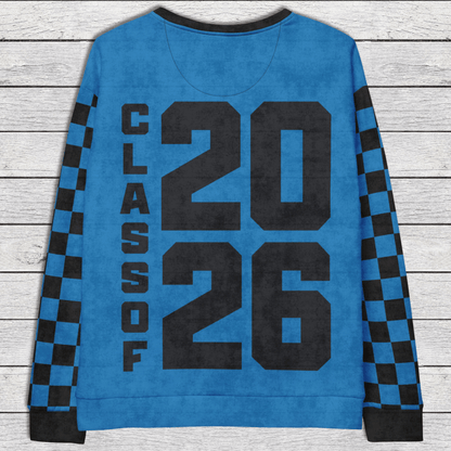 Blue sweatshirt with 'Class of 2026' text on a wooden surface