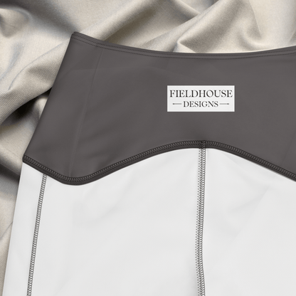 Gray waistband with 'Fieldhouse Designs' label on a textured fabric background