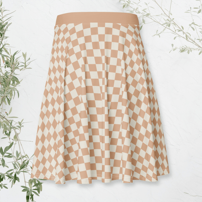 Checkered skirt with a white background and greenery
