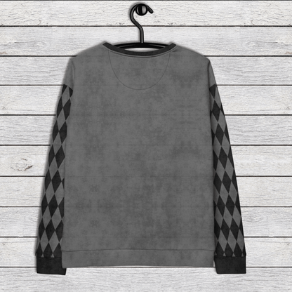 Gray sweatshirt with argyle pattern sleeves on a wooden surface