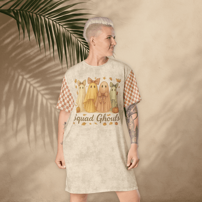 Person wearing a dress with ghost illustrations and 'Squad Ghouls' text against a beige background