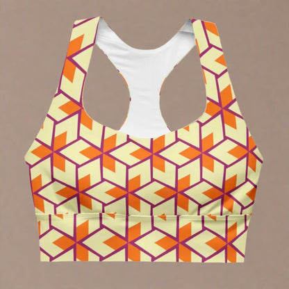 Geometric patterned sports bra on a beige background