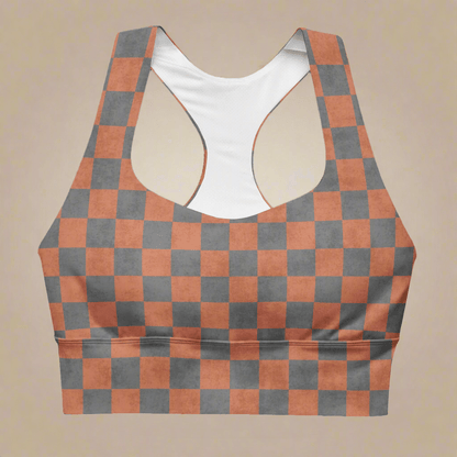 Checkered sports bra with a racerback on a neutral background