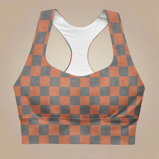 Checkered sports bra with a racerback on a neutral background