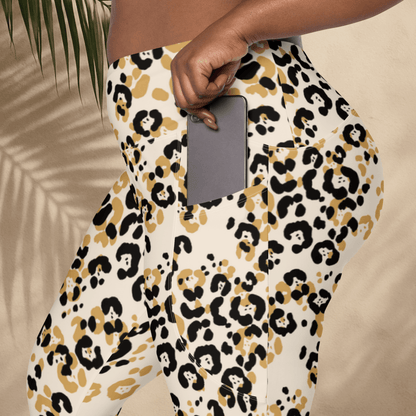 Leopard print pants worn by a person against a neutral background